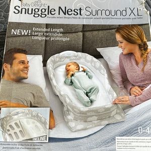 New! Box a little torn due to moving but never used baby sleeper